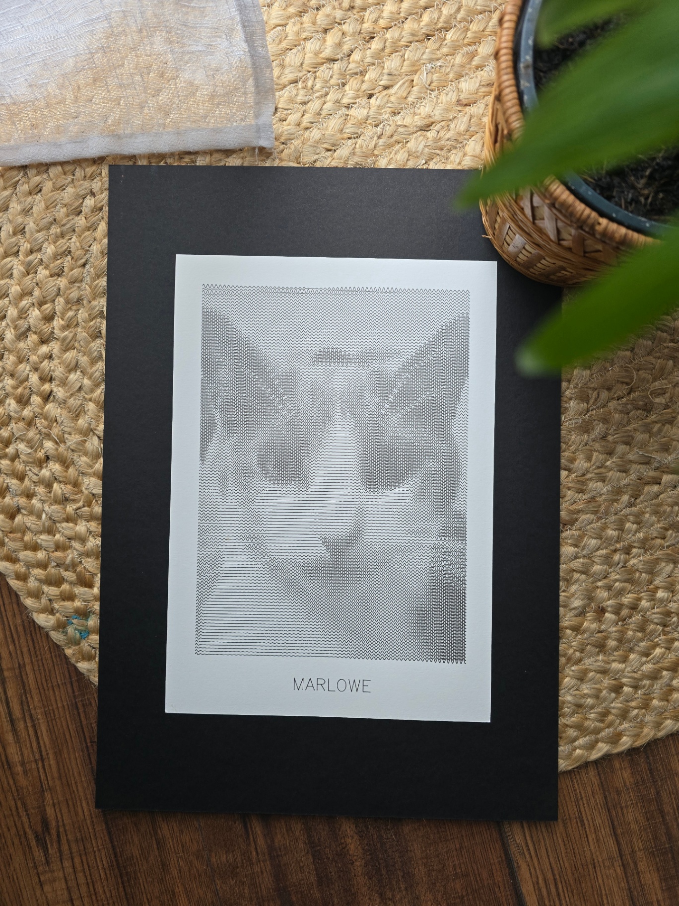 A finished MARLOWE wave portrait on cotton card